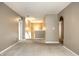 Spacious loft area with neutral carpet and paint, offering a versatile living space at 6114 Pebblebrooke Rd, Whitestown, IN 46075