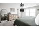 Cozy bedroom featuring a neutral color scheme, dresser and stylish mirror at 6305 N Woodhaven Dr, McCordsville, IN 46055