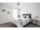 Well-lit bedroom boasts a comfortable bed and contemporary decor at 6305 N Woodhaven Dr, McCordsville, IN 46055