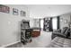 Spacious game room with a retro TMNT arcade game and comfortable seating at 6305 N Woodhaven Dr, McCordsville, IN 46055