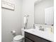 Cozy half-bathroom featuring modern fixtures, vanity, and stylish décor at 6305 N Woodhaven Dr, McCordsville, IN 46055