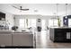 Open-concept living area with modern finishes, and seamless connection to the kitchen at 6305 N Woodhaven Dr, McCordsville, IN 46055