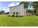 The exterior of the house shows brick and gray siding, manicured lawn, and a view of the deck at 6518 Springview Dr, Avon, IN 46123