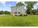 The exterior shows a combination of brick and gray siding, a well-kept lawn, and a charming deck area at 6518 Springview Dr, Avon, IN 46123
