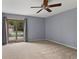 Bedroom featuring sliding glass door to a porch and ceiling fan at 6518 Springview Dr, Avon, IN 46123