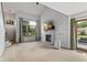 Spacious living room featuring a fireplace, high ceilings and a back patio at 6518 Springview Dr, Avon, IN 46123