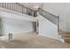 Spacious living room featuring high ceilings and a balcony view at 6518 Springview Dr, Avon, IN 46123