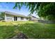 Large back yard featuring a healthy, green lawn and a privacy fence at 6963 N Abilene Way, McCordsville, IN 46055