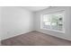 Bright bedroom with neutral carpet and a large window to let in plenty of natural light at 6963 N Abilene Way, McCordsville, IN 46055