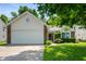 Charming single-Gathering home with a two-car garage, complemented by a lush green lawn and mature trees at 6963 N Abilene Way, McCordsville, IN 46055