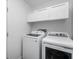 Convenient laundry room with new appliances and lots of storage, perfect for easy laundry days at 6963 N Abilene Way, McCordsville, IN 46055