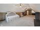 Bonus room features a daybed and desk area, perfect for relaxation and productivity at 6983 White Oak Dr, Avon, IN 46123