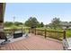 Outdoor deck with a fire pit and seating, perfect for relaxing and enjoying the view at 6983 White Oak Dr, Avon, IN 46123