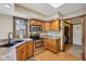Modern galley kitchen featuring stainless appliances and granite countertops and lots of natural light at 6983 White Oak Dr, Avon, IN 46123