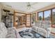Bright living room with French doors and a view to the backyard patio at 6983 White Oak Dr, Avon, IN 46123