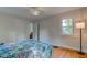 Bedroom featuring hardwood floors, a ceiling fan, and lots of natural light at 715 Kessler Blvd E Dr, Indianapolis, IN 46220