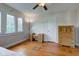 Bright bedroom with hardwood flooring and natural light, complete with stylish vanity and dresser at 715 Kessler Blvd E Dr, Indianapolis, IN 46220