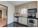Well-maintained kitchen featuring stainless steel appliances and a practical layout at 715 Kessler Blvd E Dr, Indianapolis, IN 46220