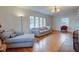 Open living room with hardwood floors, neutral decor, and a cozy seating area for relaxation at 715 Kessler Blvd E Dr, Indianapolis, IN 46220