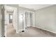 Bedroom with neutral walls, closet, and a connected room provides comfort and functionality at 7430 Railway Ct, Indianapolis, IN 46256