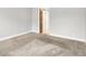 Neutral bedroom with carpet, white trim, and a closet, offering a calming and versatile space at 7430 Railway Ct, Indianapolis, IN 46256