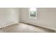 Bright bedroom with a window and neutral decor, perfect for relaxation and comfort at 7430 Railway Ct, Indianapolis, IN 46256