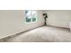 Bright and airy bedroom with a large window offers a serene and inviting retreat at 7430 Railway Ct, Indianapolis, IN 46256
