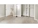 Bedroom with neutral walls, closet, and a connected room provides comfort and functionality at 7430 Railway Ct, Indianapolis, IN 46256