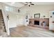 Spacious living room features a loft, fireplace, and plenty of natural light at 7430 Railway Ct, Indianapolis, IN 46256