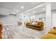 Finished basement boasts a neutral color palette and lots of natural light at 745 Ridge Gate Dr, Brownsburg, IN 46112