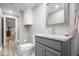 Neutral half bathroom features updated vanity and modern fixtures at 745 Ridge Gate Dr, Brownsburg, IN 46112