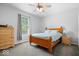 Light-filled bedroom with a bed and dresser at 745 Ridge Gate Dr, Brownsburg, IN 46112
