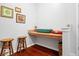 Cozy flex room or nook offers a built-in desk and wood floors at 745 Ridge Gate Dr, Brownsburg, IN 46112