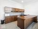 Office boasts custom built-ins and plenty of storage and counter space at 745 Ridge Gate Dr, Brownsburg, IN 46112