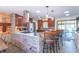 Modern kitchen with stainless steel appliances, stone accent wall, and bar-style seating at 7850 S Mooresville Rd, Indianapolis, IN 46113
