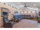 Vaulted ceilings and ample seating highlight the spacious living room with a cozy and inviting atmosphere at 7850 S Mooresville Rd, Indianapolis, IN 46113