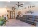 Spacious living room with vaulted ceilings, a comfortable sectional sofa, and stylish decor at 7850 S Mooresville Rd, Indianapolis, IN 46113