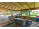 Outdoor living space featuring an outdoor sectional, patio and ceiling fans at 7850 S Mooresville Rd, Indianapolis, IN 46113