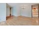 Spacious dining room featuring hardwood floors, light blue walls and ample room for gatherings at 8071 Chiltern Dr, Indianapolis, IN 46268