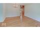 Elegant dining room with hardwood floors and a chandelier, creating a perfect space for meals at 8071 Chiltern Dr, Indianapolis, IN 46268