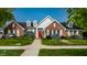 Community clubhouse with brick facade and landscaped grounds at 8223 Thoroughbred Run, Indianapolis, IN 46256