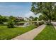 Community pond with landscaped surroundings at 8223 Thoroughbred Run, Indianapolis, IN 46256