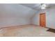 Attic space with exposed beams, offering potential for a unique living area or storage conversion at 8371 N 400 W, Fairland, IN 46126
