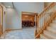 Spacious foyer leading to a dining room with a chandelier and a grand wooden table set at 8371 N 400 W, Fairland, IN 46126