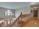 Bright two-story foyer with hardwood floors, wooden staircase, chandelier and large windows with transoms at 8371 N 400 W, Fairland, IN 46126