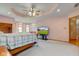 Spacious main bedroom suite with tray ceiling, neutral walls, and multiple windows at 8371 N 400 W, Fairland, IN 46126