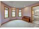 Bright main bedroom with three windows and views of the surrounding landscape at 8371 N 400 W, Fairland, IN 46126