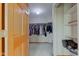 Well-organized walk-in closet with ample hanging space and built-in shelves at 8371 N 400 W, Fairland, IN 46126