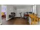 Flex room featuring wood-look floors and office setup at 9125 Timpani Way, Indianapolis, IN 46231