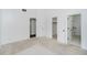 Spacious bedroom with neutral carpet and paint, featuring a view into the en-suite bathroom at 9363 Hadway Dr, Indianapolis, IN 46256